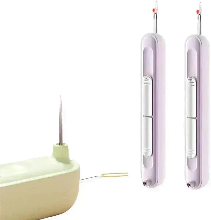 Two electronic needles and a power adapter on a white background
