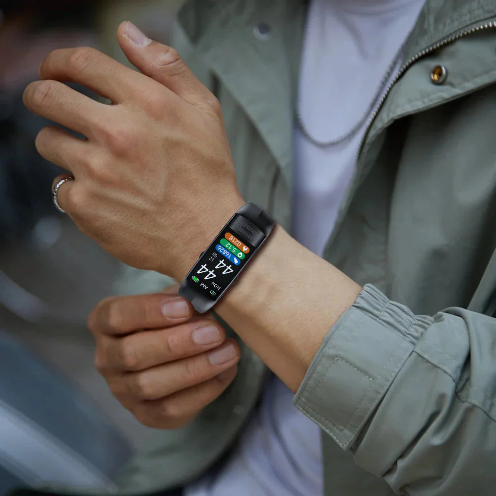 Person wearing a smartwatch on their wrist with a blurred background