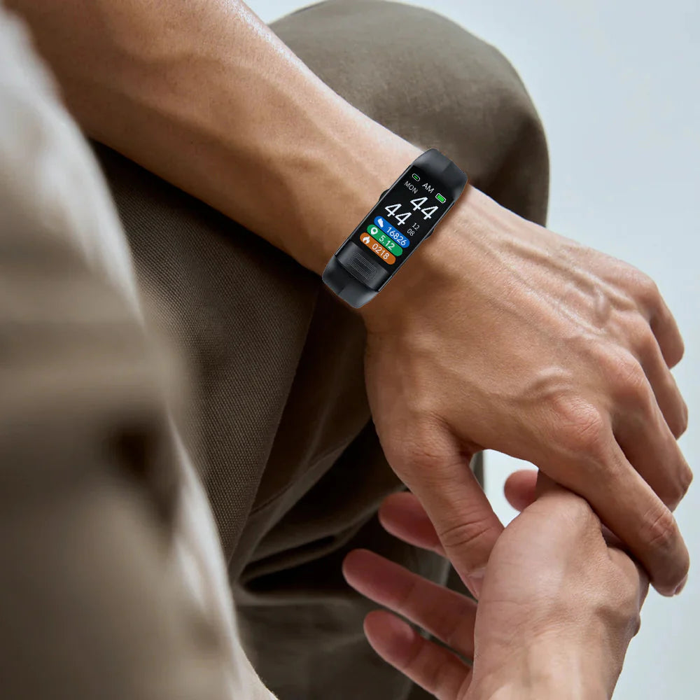 Person wearing a smartwatch with a blurred background