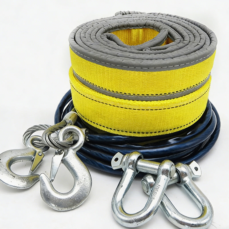 Coiled yellow and blue towing strap with metal hooks on a white background