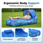 Inflatable lounge with ergonomic design features on a grassy background