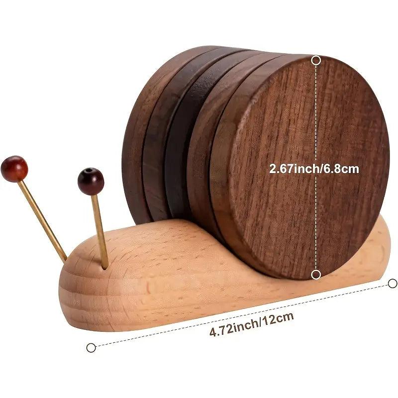 Wooden snail-shaped coaster set with dimensions on a white background
