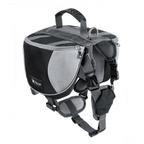 Black and gray dog harness with a bag on a white background