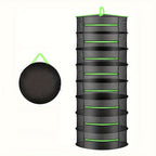 Black mesh hanging dryer with green accents on a white background