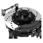 Close-up of a brake rotor with a hand using a wrench on a white background