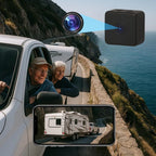 Two people in a car with a scenic view of a road and ocean, showing a camera and phone screen.
