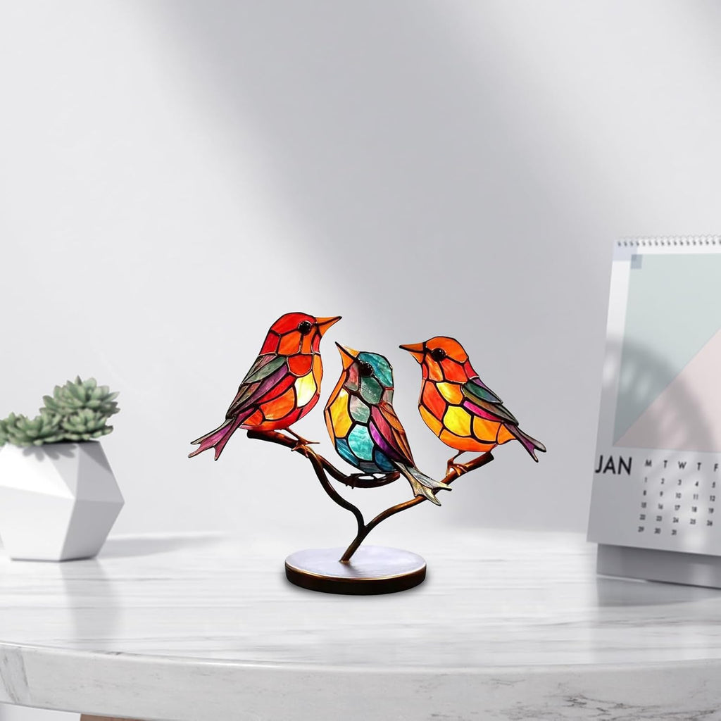 Colorful stained glass bird lamp on a branch with a white background