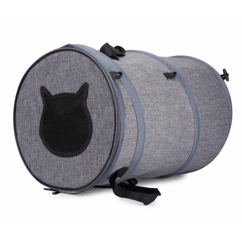 Gray pet carrier with black cat silhouette on a white background