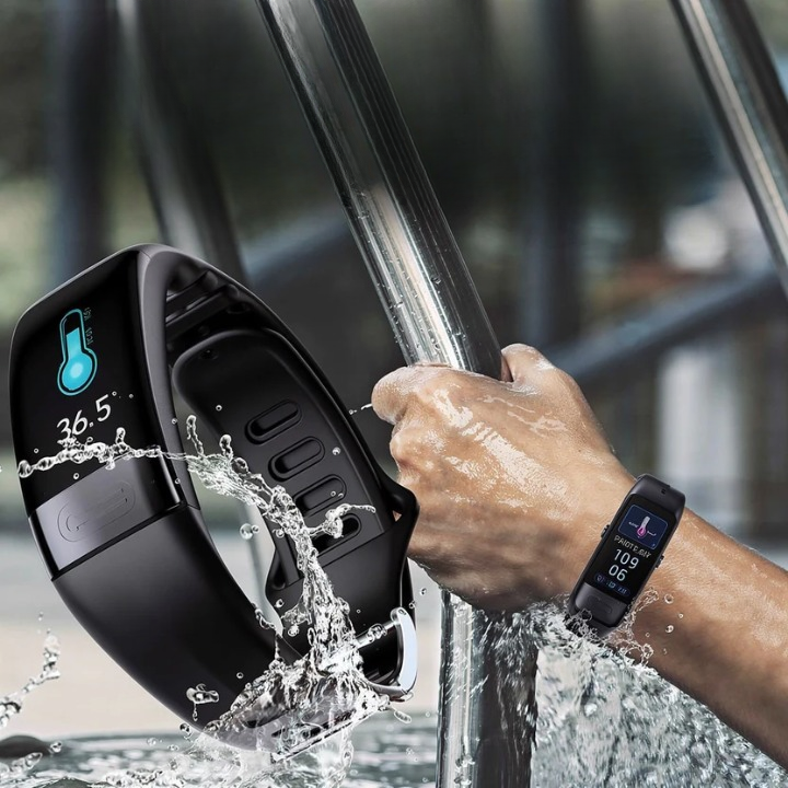 Smartwatch being used to open a car door with water splashing around it