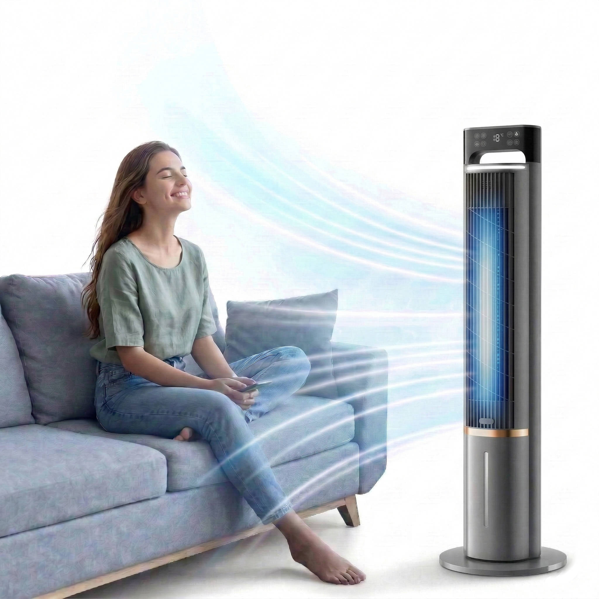 Woman sitting on a couch with a tower fan blowing air towards her