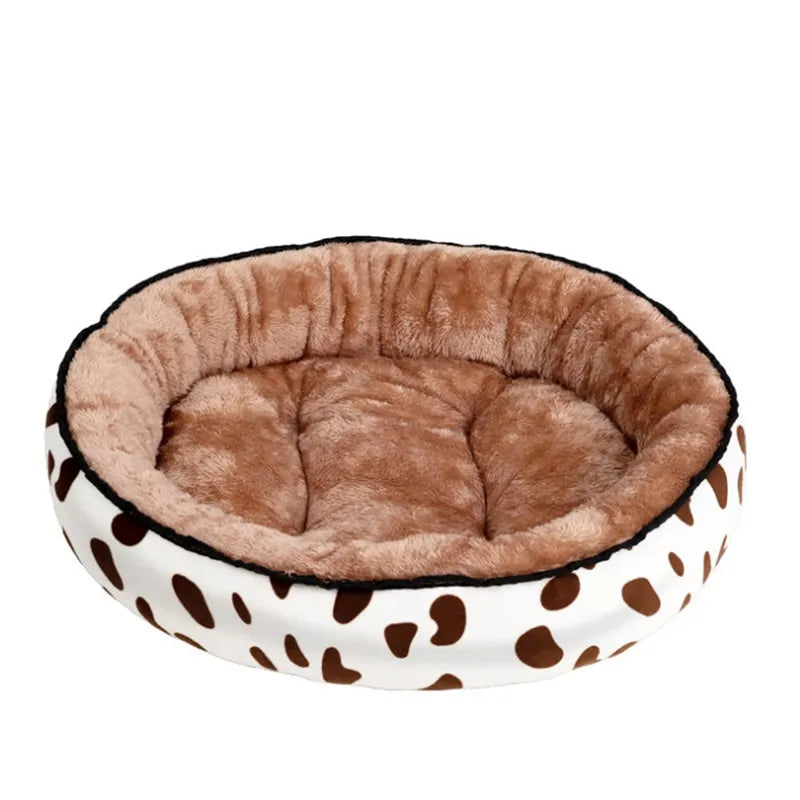 Brown pet bed with polka dot pattern on a white background