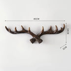 Decorative antlers with measurements on a white background
