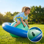 Child playing on a large inflatable ball in a park